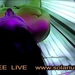 Horny Girl with big breasts masturbates under the solarium