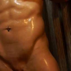 Bodybuilder With Huge Fake Tits Oils Up